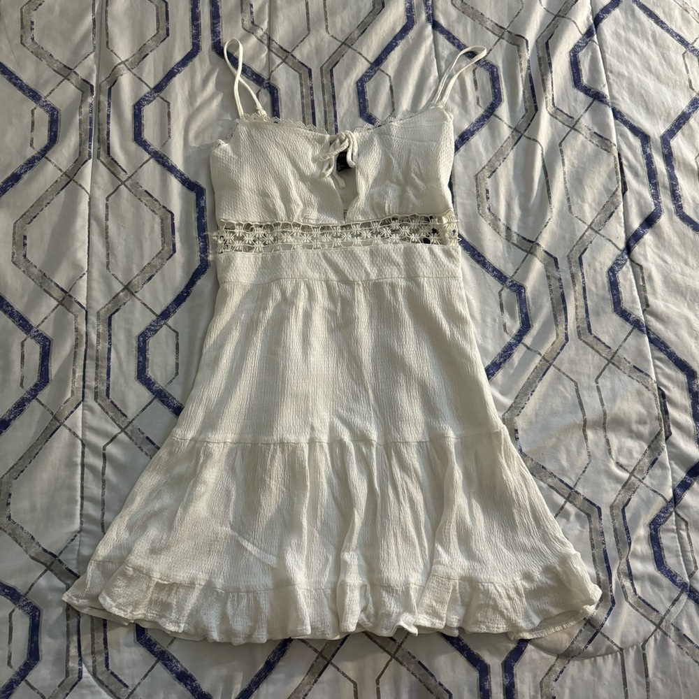 white summer dress with lace trim and adjustable straps